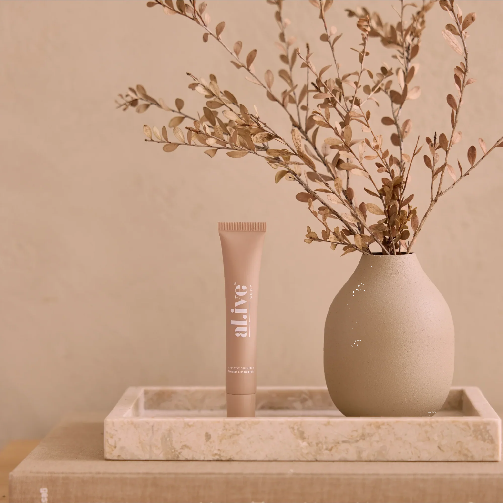 AL.IVE BODY - TINTED LIP BUTTER | APRICOT SHIMMER - Image 2